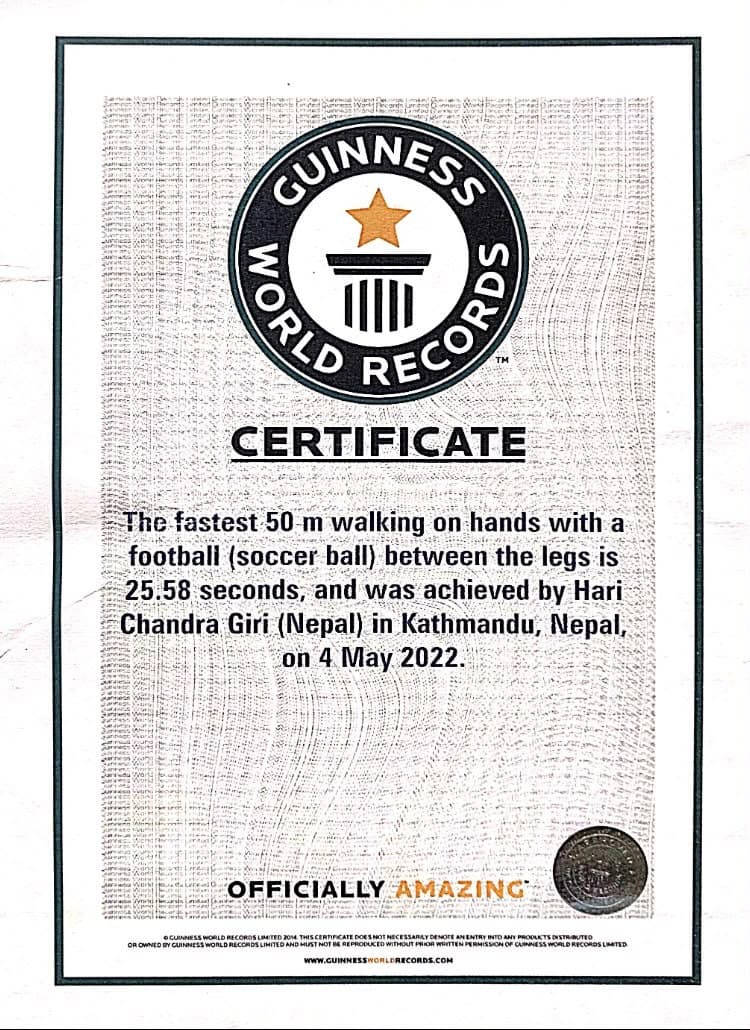 Guinness World Records certificate — Fastest 50 m walking on hands with a football between the legs